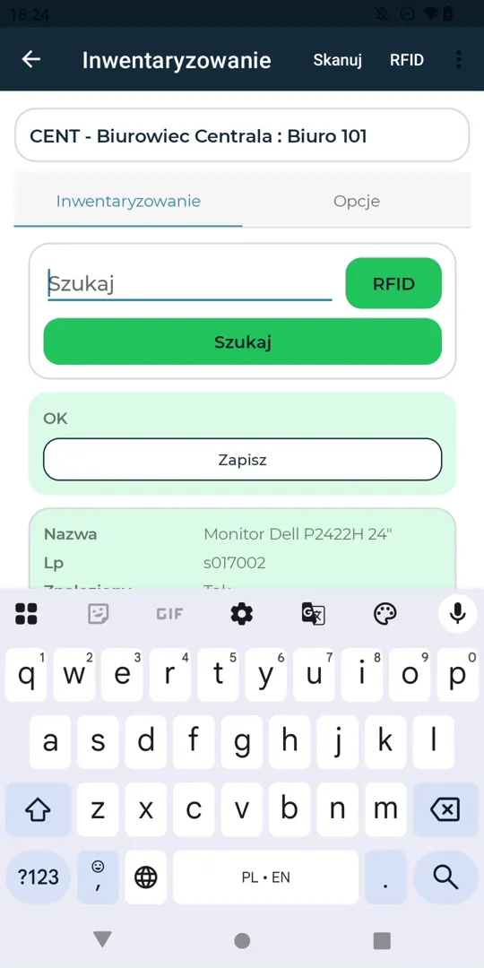 Ekran inwentaryzowania w aplikacji mobilnej: lokalizacja Biurowiec Centrala, Biuro 101, pole kodu, przyciski Szukaj i RFID oraz dane odnalezionego monitora